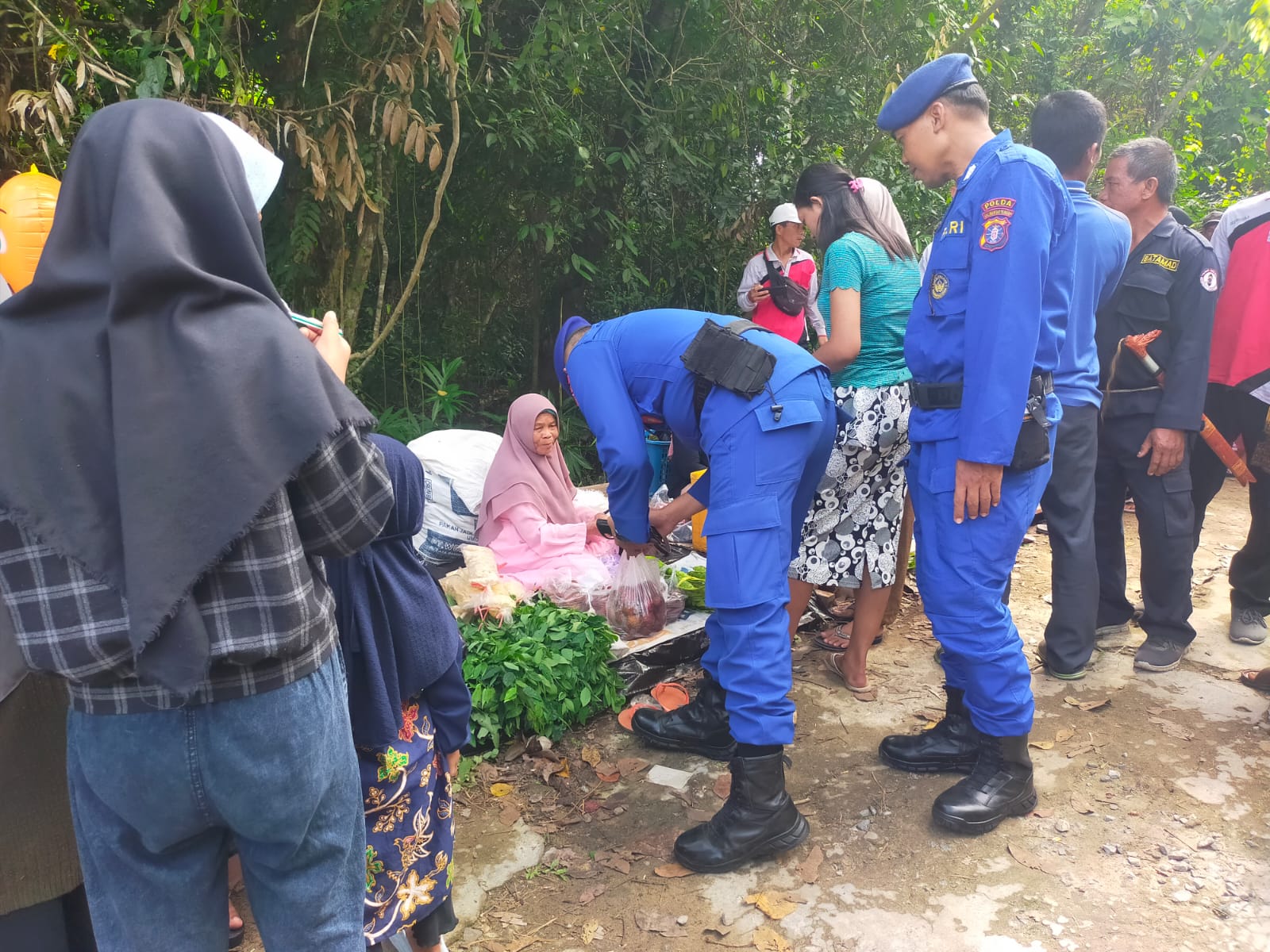 Personel KP XVIII-2006 Ditpolairud Hadiri Undangan Peresmian Pasar Rakyat Desa Rawasari